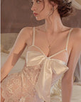 Open-back lace bodysuit with crotchless design.