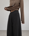 Soft, fluid wide-leg trousers with a comfortable wide waistband.