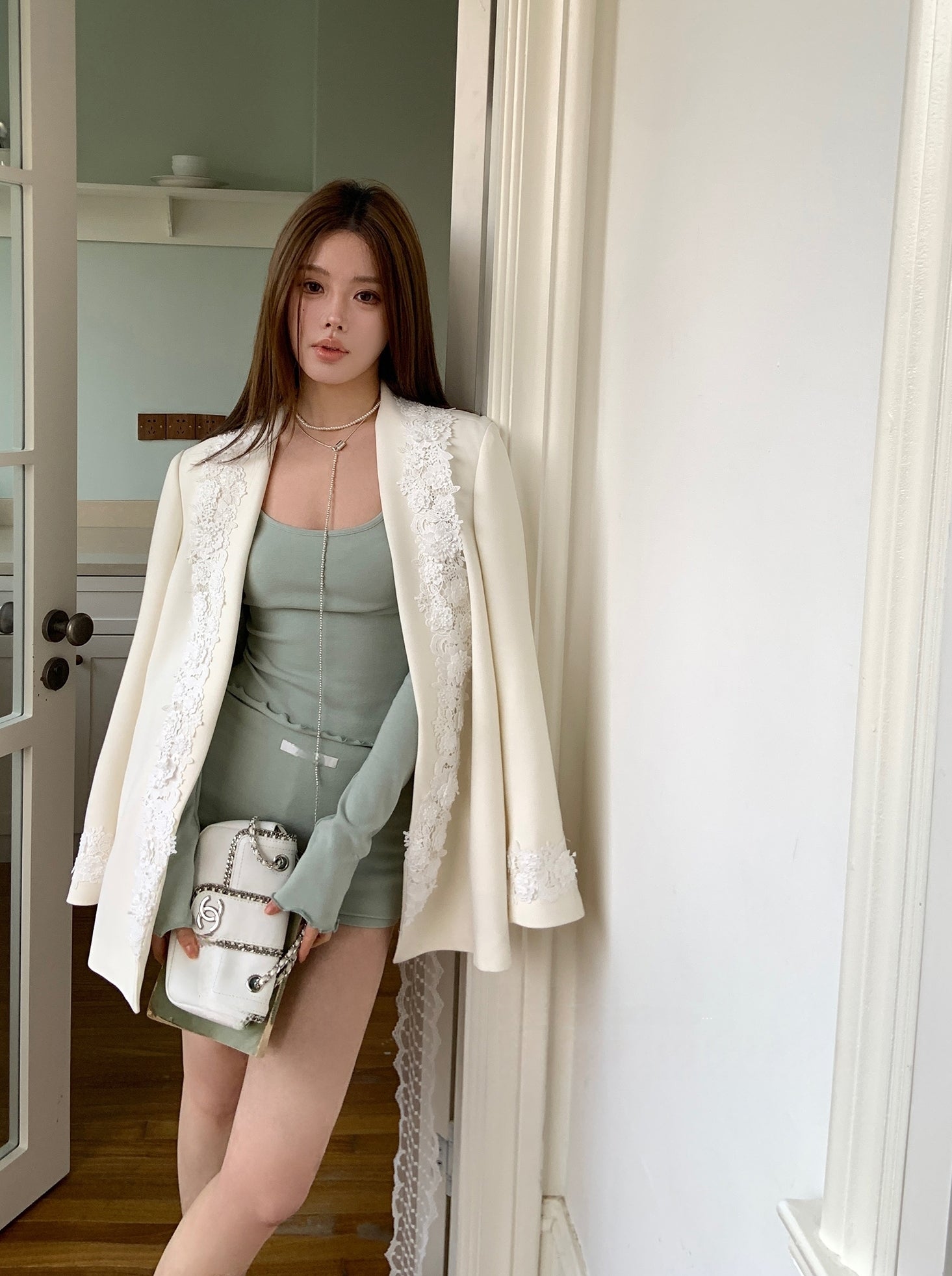 Statement lace-panelled couture blazer