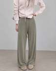 Soft, fluid wide-leg trousers with a comfortable wide waistband.