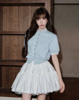Slim-fit contrast knit top with faux layered design