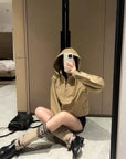 Khaki hooded windbreaker jacket