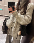 Korean-style wool knit cardigan with a relaxed, stylish design