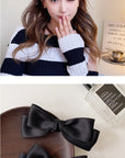 Black Bow Temperament Barrettes (1 Pair)