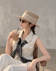 Chic polo-style tweed vest with a matching scarf.