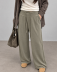 Soft, fluid wide-leg trousers with a comfortable wide waistband.