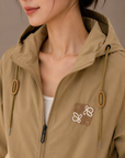 Khaki hooded windbreaker jacket
