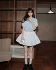 Slim-fit contrast knit top with faux layered design