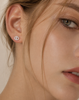 Full pavé stud earrings with a chic, luxe look
