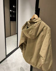 Khaki hooded windbreaker jacket