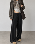 Soft, fluid wide-leg trousers with a comfortable wide waistband.