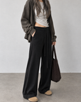 Soft, fluid wide-leg trousers with a comfortable wide waistband.