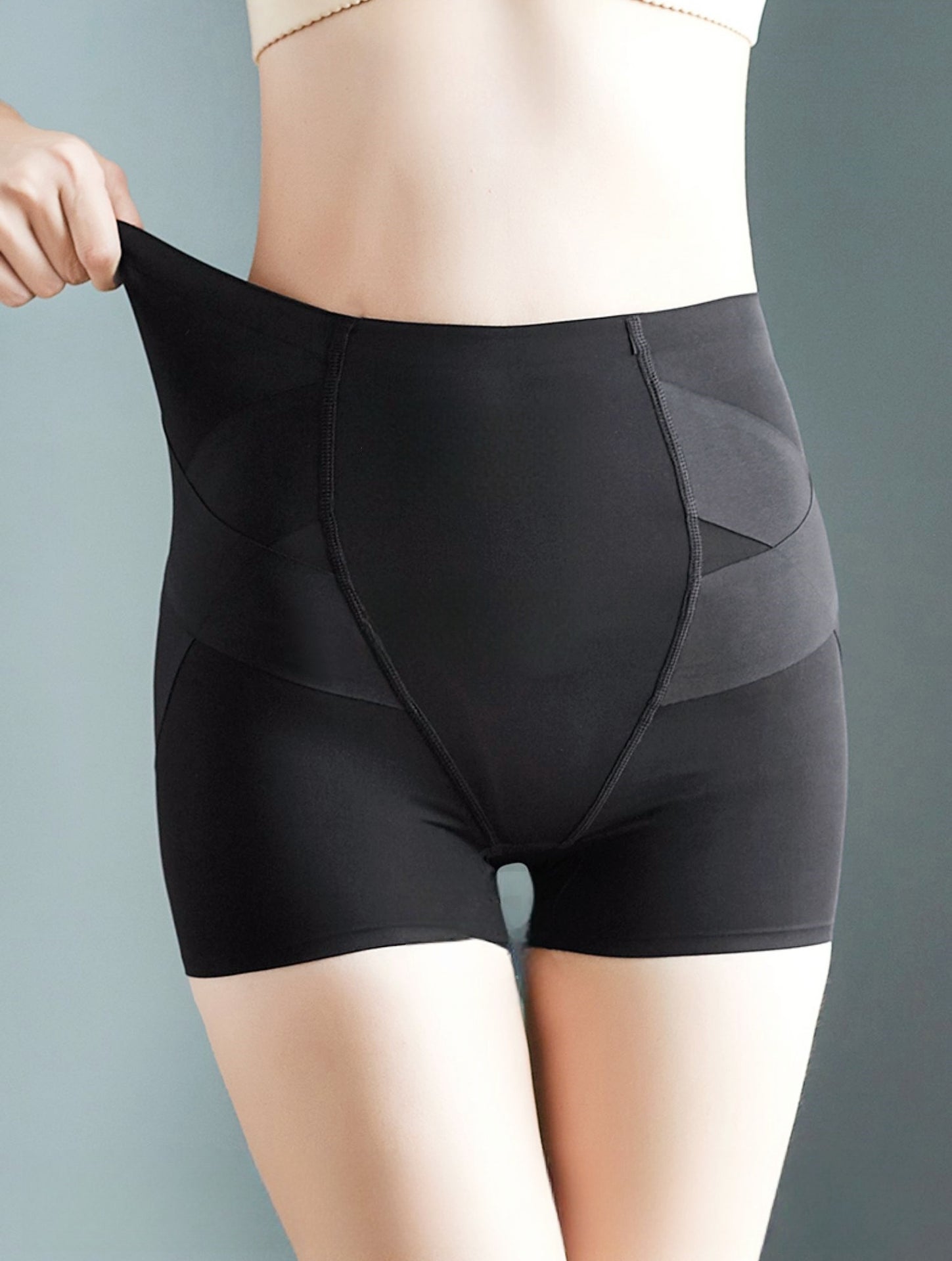 Postpartum pelvic bone correction and abdominal and hip lifting underwear.