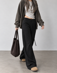 Soft, fluid wide-leg trousers with a comfortable wide waistband.