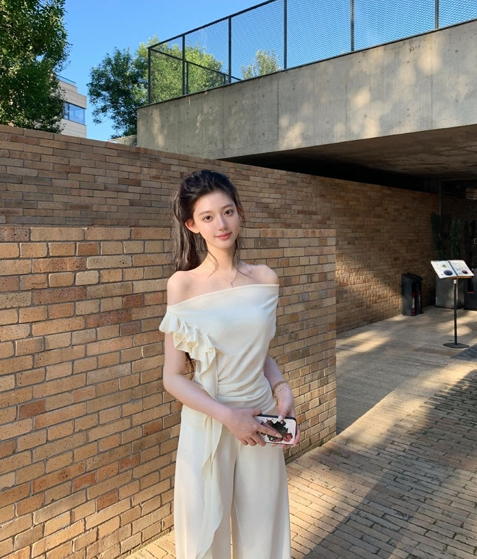 Asymmetric off-shoulder ruffle-drape top