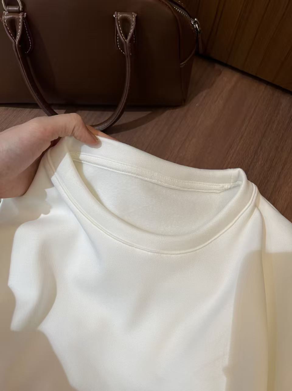 Fleece-lined loose-fit slit hem base layer top