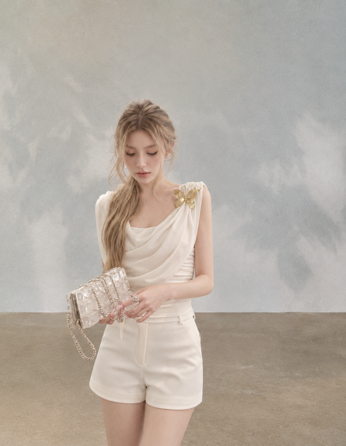 Asymmetrical Draped Neckline Top with Bow Brooch