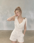 Asymmetrical Draped Neckline Top with Bow Brooch