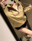 Khaki hooded windbreaker jacket
