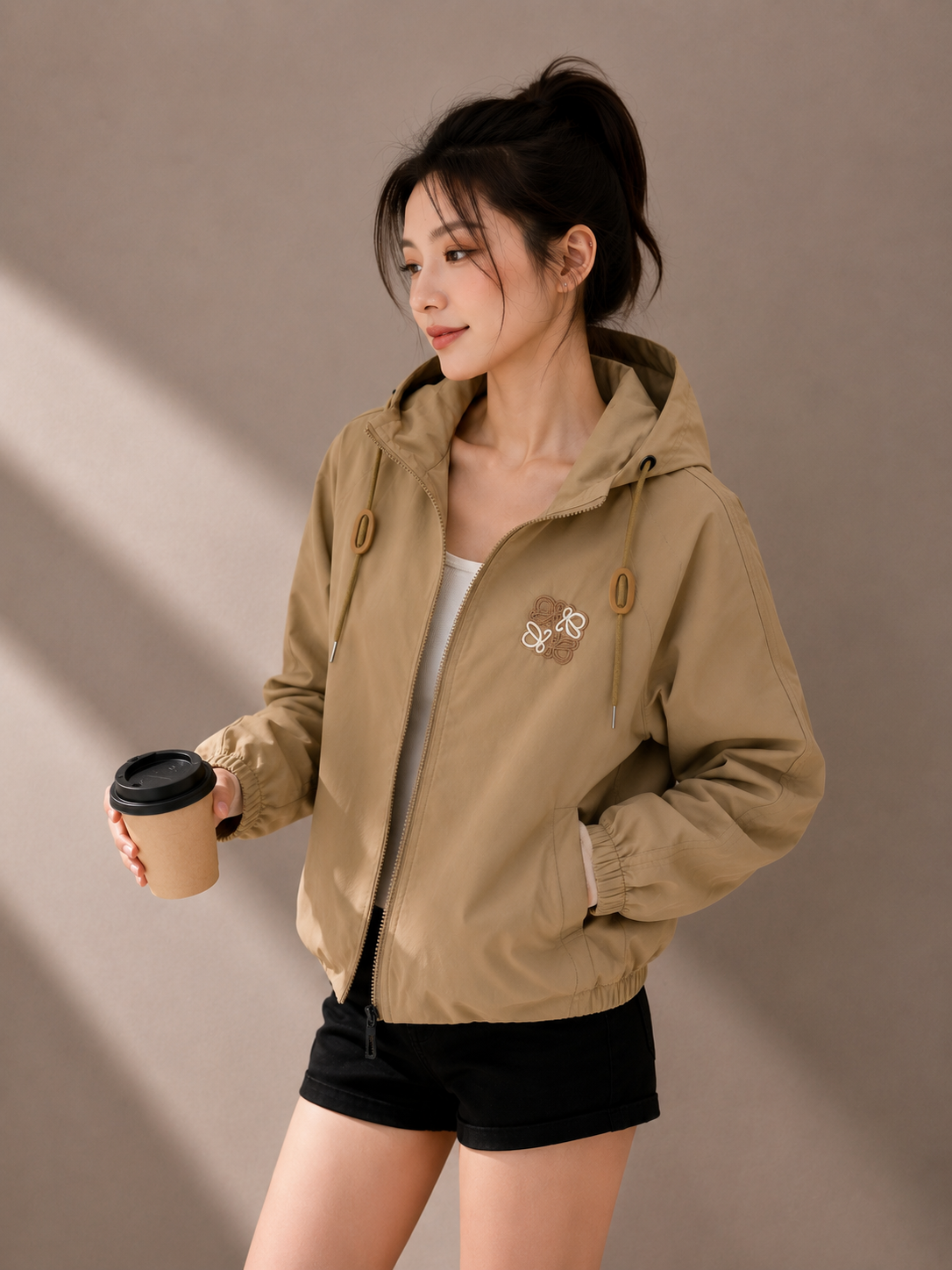 Khaki hooded windbreaker jacket