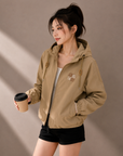 Khaki hooded windbreaker jacket