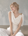 Asymmetrical Draped Neckline Top with Bow Brooch
