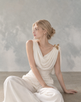 Asymmetrical Draped Neckline Top with Bow Brooch