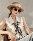 Chic polo-style tweed vest with a matching scarf.