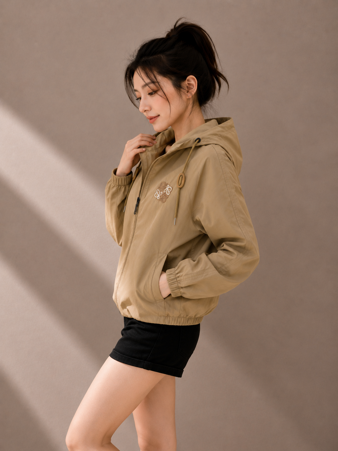 Khaki hooded windbreaker jacket