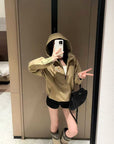 Khaki hooded windbreaker jacket