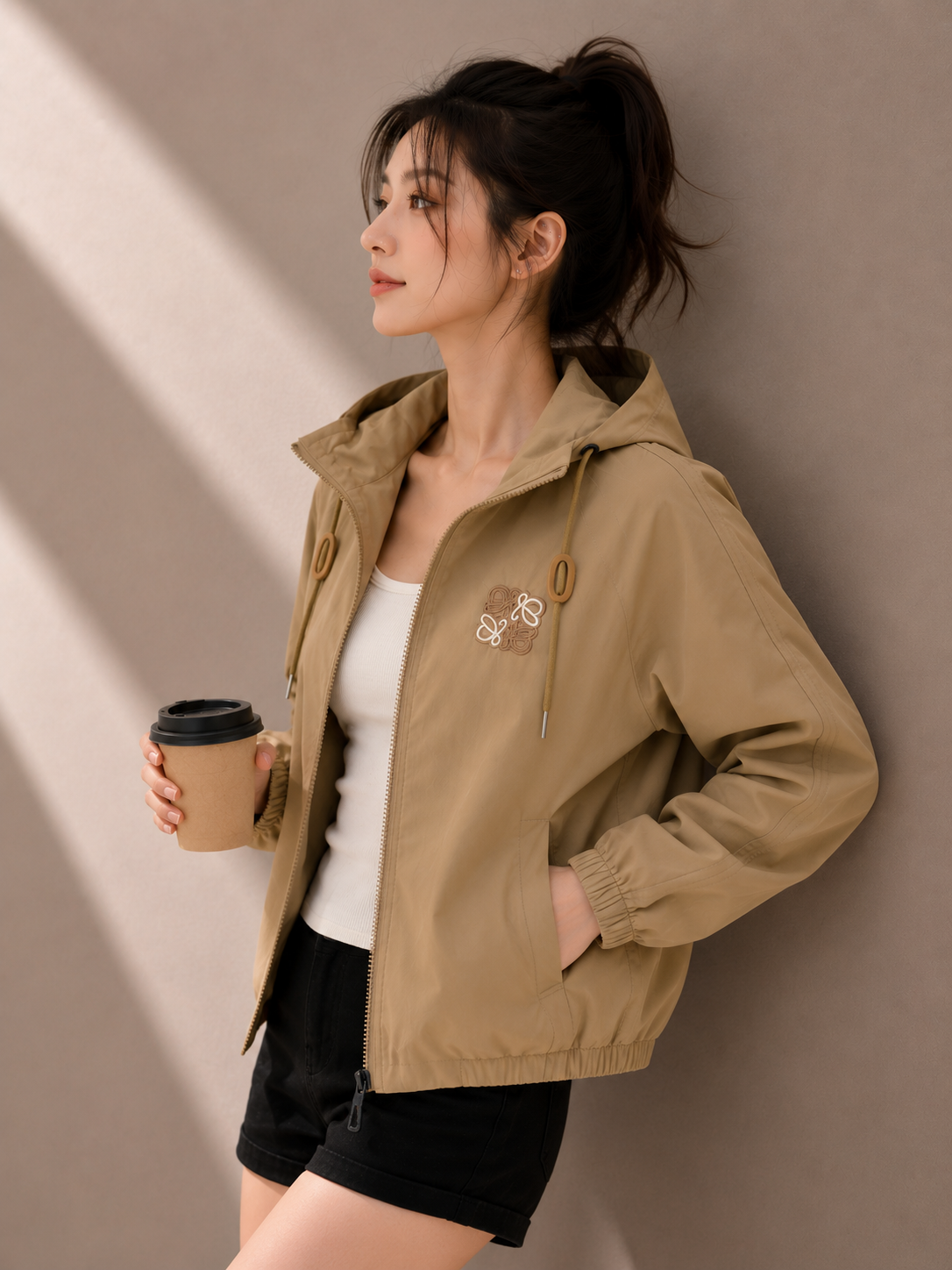 Khaki hooded windbreaker jacket