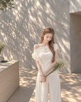 Asymmetric off-shoulder ruffle-drape top
