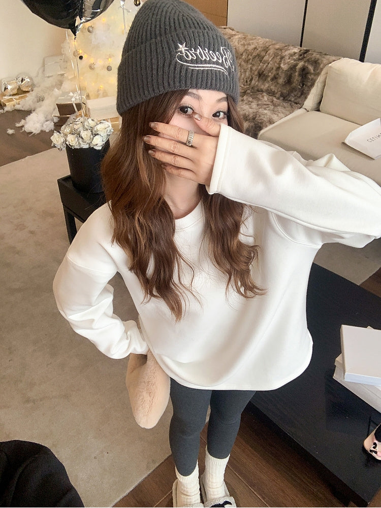 Fleece-lined loose-fit slit hem base layer top