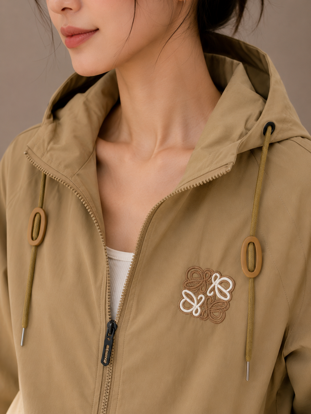 Khaki hooded windbreaker jacket