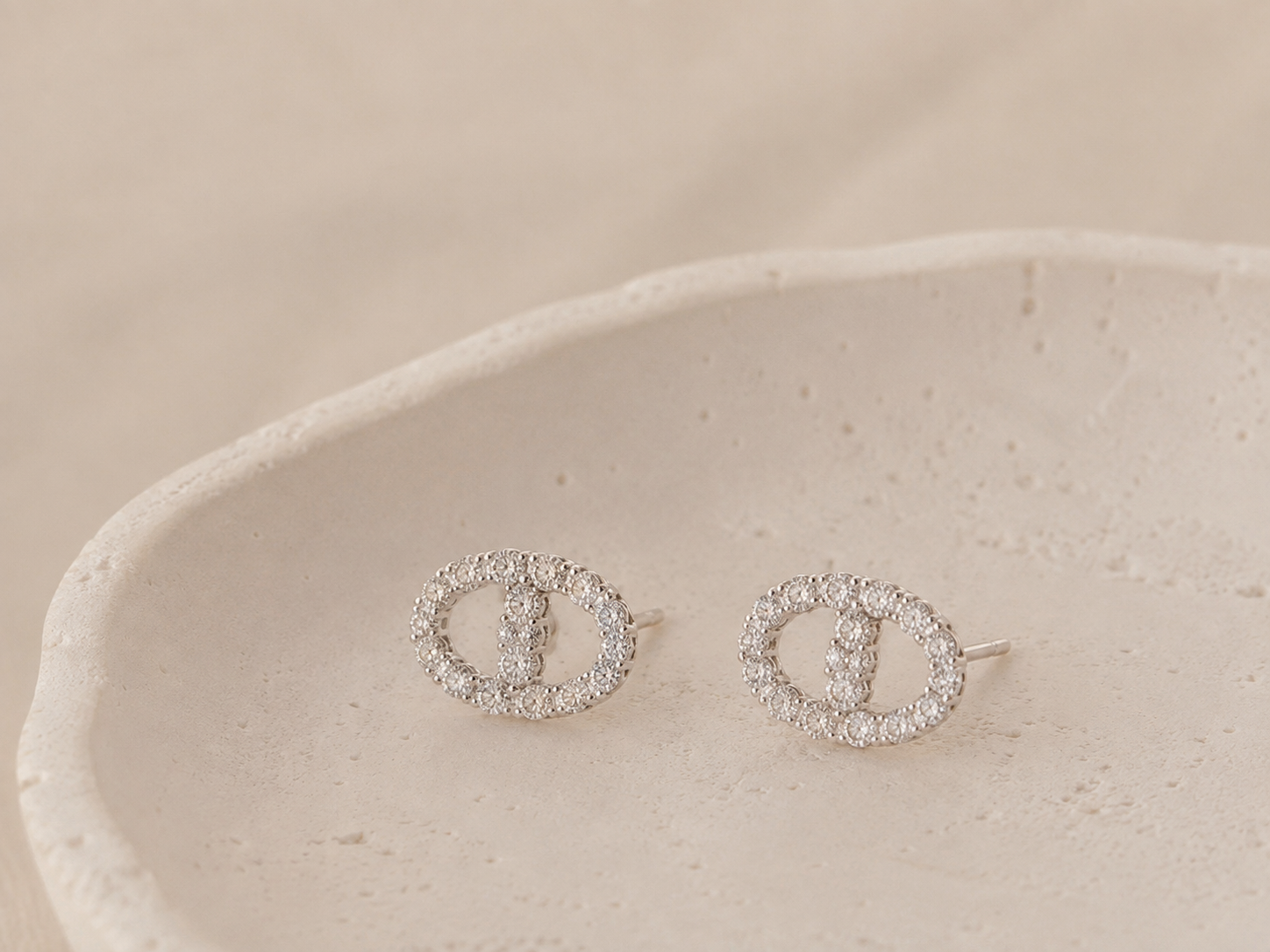 Full pavé stud earrings with a chic, luxe look