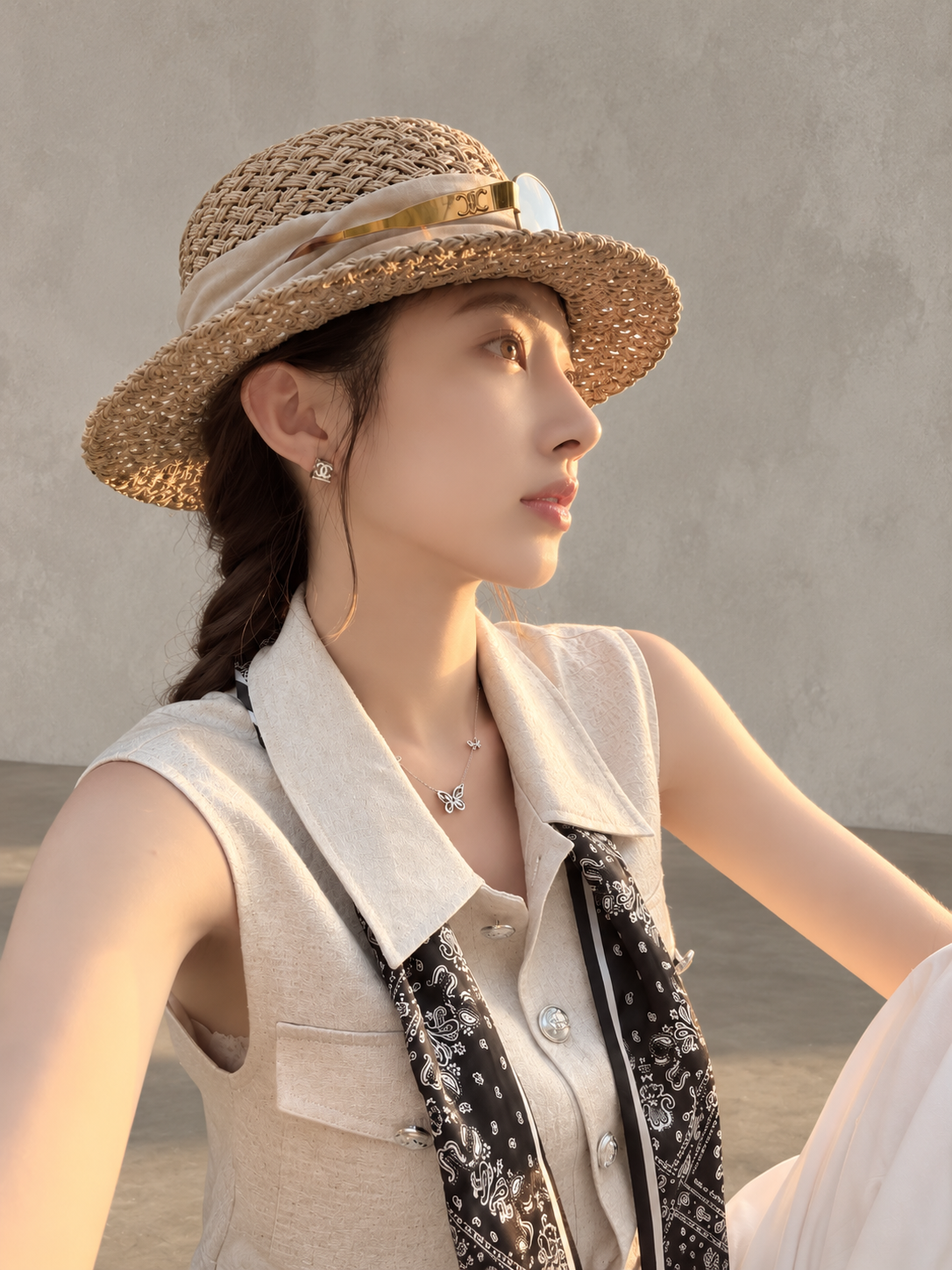 Chic polo-style tweed vest with a matching scarf.