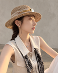 Chic polo-style tweed vest with a matching scarf.