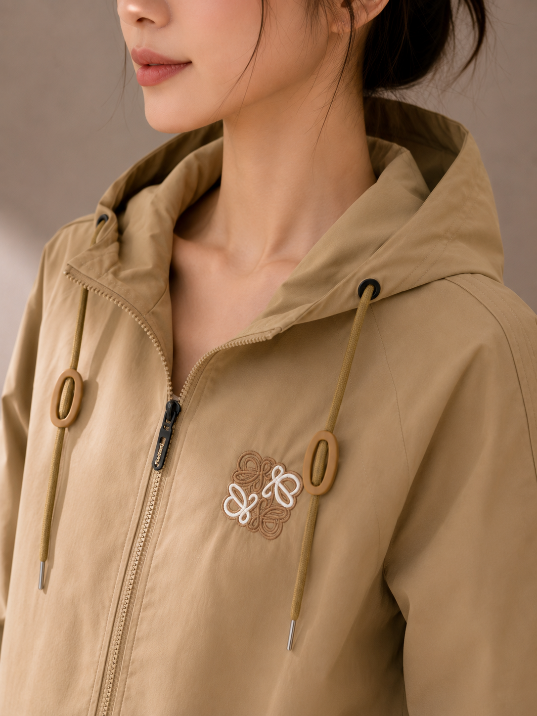 Khaki hooded windbreaker jacket
