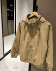 Khaki hooded windbreaker jacket