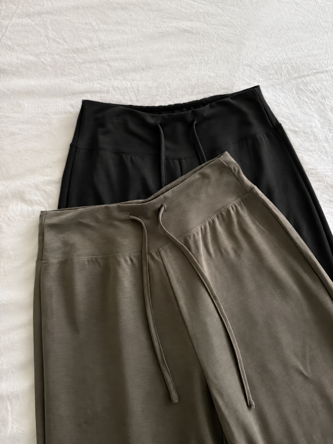 Soft, fluid wide-leg trousers with a comfortable wide waistband.
