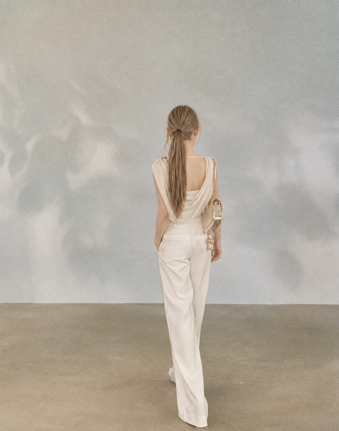Asymmetrical Draped Neckline Top with Bow Brooch