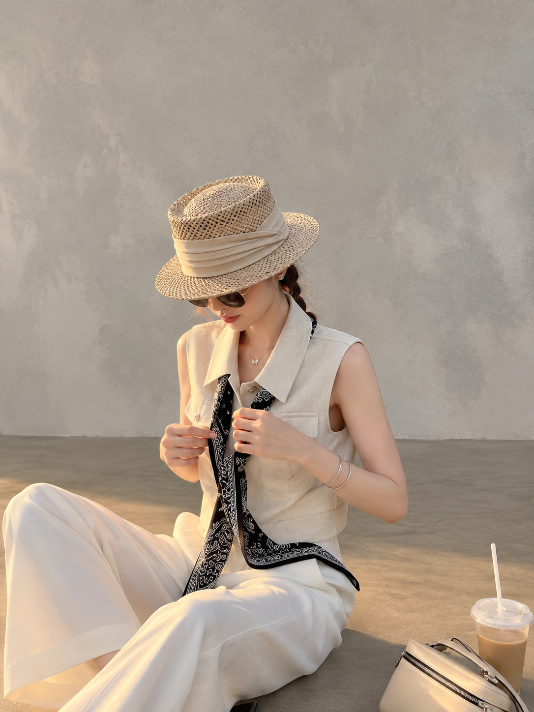 Chic polo-style tweed vest with a matching scarf.