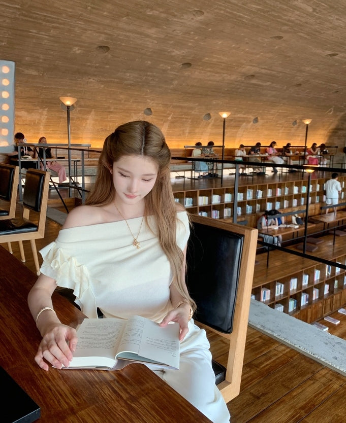 Asymmetric off-shoulder ruffle-drape top