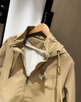 Khaki hooded windbreaker jacket